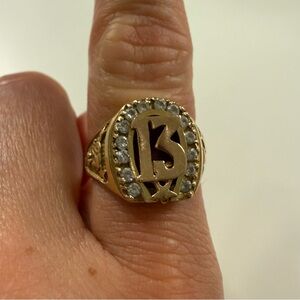10k. Gold Ring with Number 13 and Gem Accents .
